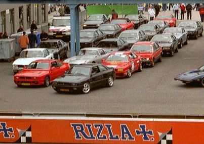 Lots of maserati's on racing track